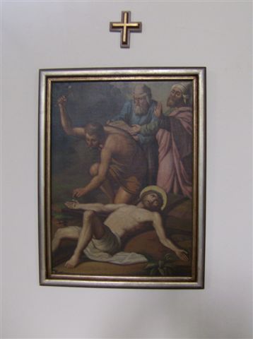 11. Station: Jesus wird an das Kreuz genagelt
